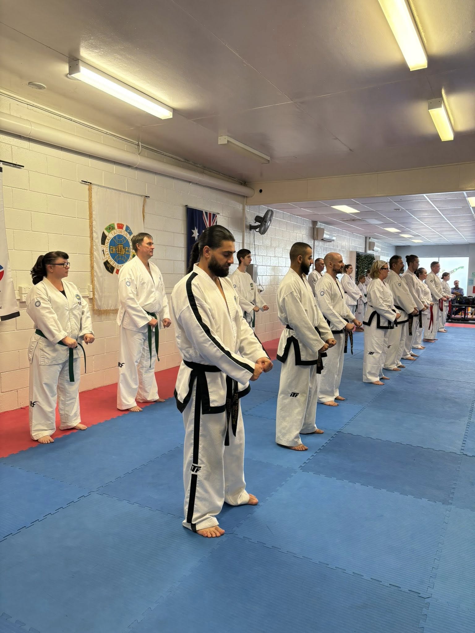 MMAFC black belts lined up in class